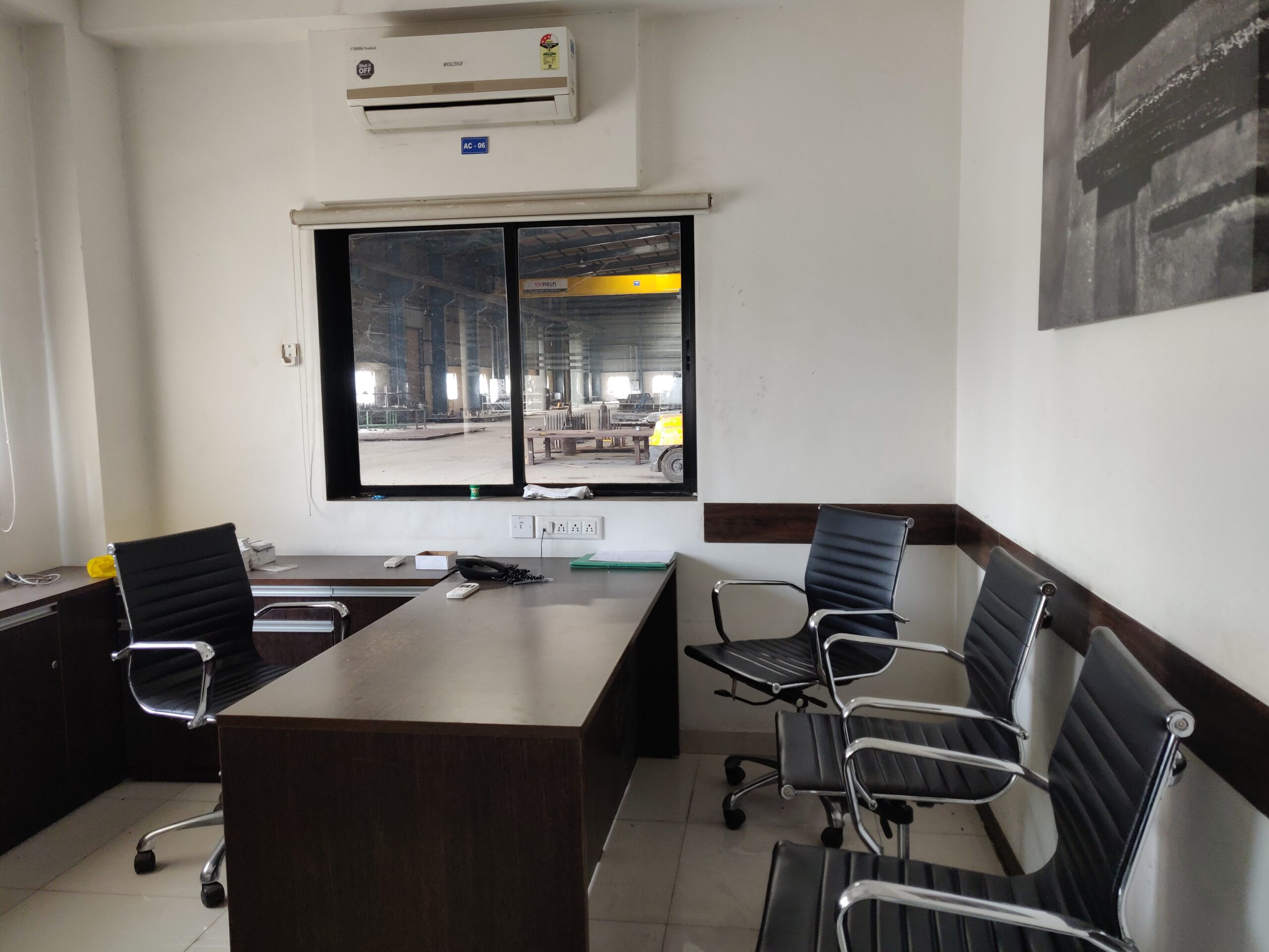 Office interior at a CIPL industrial facility overlooking the shop floor